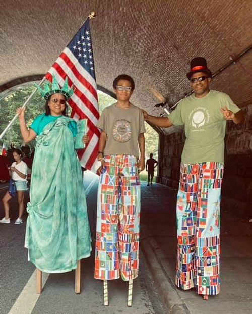 Lady Liberty on stilts at One World Day