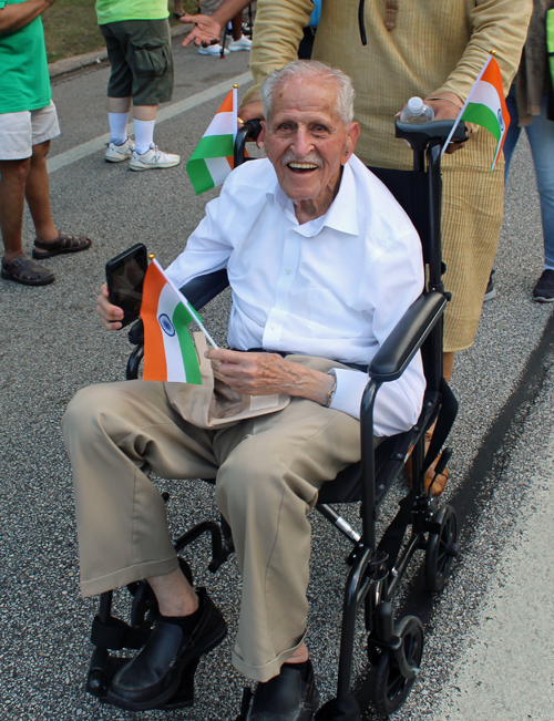 Centenarian Om Julka in the Parade of Flags