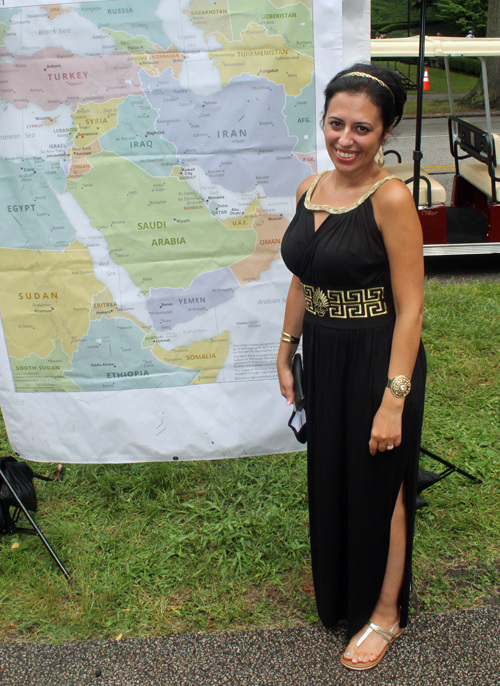 Rania Abbadi in front of the map of Jordan