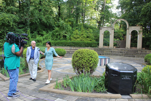 Dr. Wael Khoury being interviewed by Nadeen Abusada in the Syrian Cultural Garden