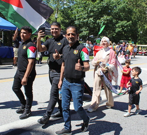 Jordan Community in Parade of Flags at at One World Day