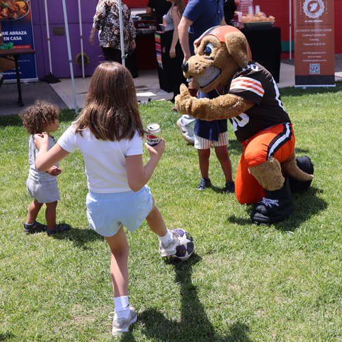 Cleveland Browns Mascot Chomps playing soccer