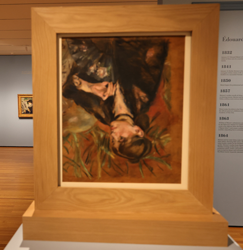 Painting displayed upside-down.