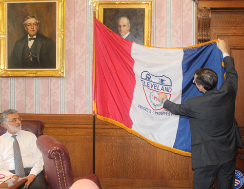 Explaining the Flag of Cleveland in Red Room in Cleveland City Hall