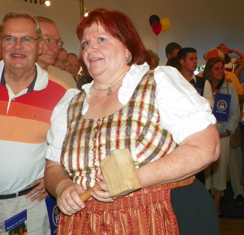 Ingrid Pejsa tapping the keg at Cleveland Oktoberfest