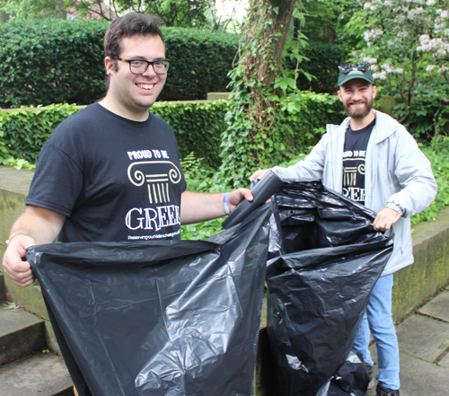 Volunteers Michael Zanoudakis, Camp helper with Jonathan Cambouris, president of the Hellenic Preservation Societyin the Greek Garden