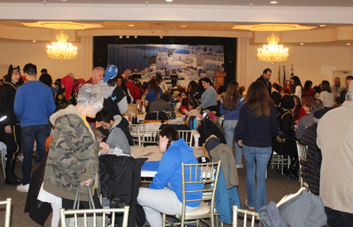 Crowded Greek hall