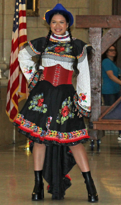 Latina Image Fashion Show ladies in colorful costumes