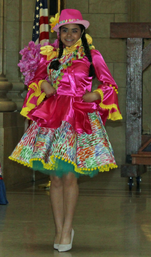 Latina Image Fashion Show ladies in colorful costumes