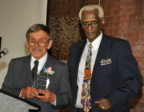 Aklilu Demessie presents the CIHF award to Carl Robson