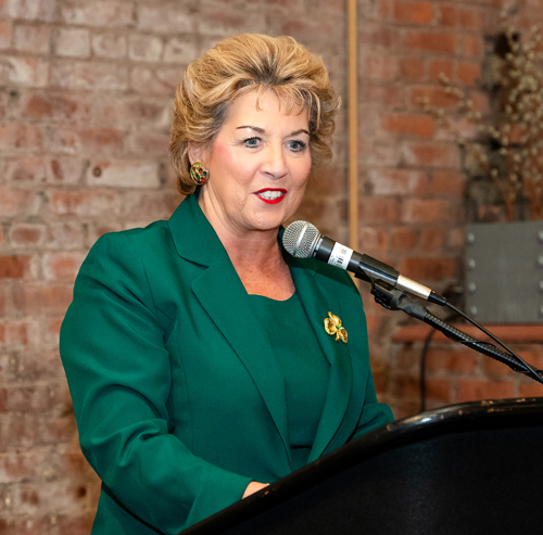 Ambassador Geraldine Byrne Nason inducting Ambassador Edward Crawford