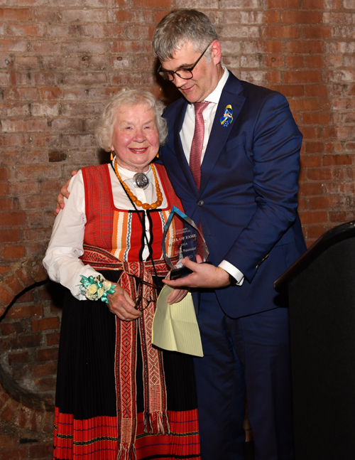 Erika Puussaar receives award from Estonian Ambassador Kristjan Prikk