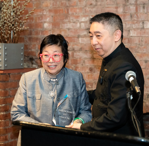 Margaret Wong inducting Johnny Wu into Hall of Fame