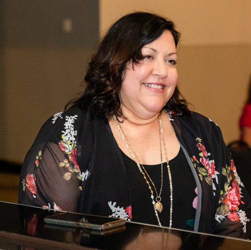 Veronica Dahlberg speaks at the Cleveland International Hall of Fame induction