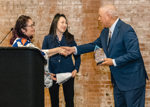 Lisa Wong inducting Beverly Kerecman with Russ Mitchell