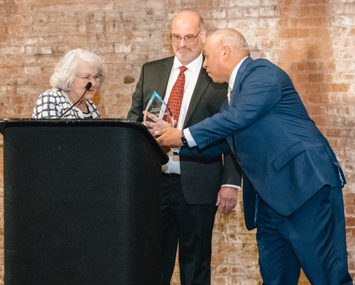 Russ Mitchell gives award to Branka Malinar
