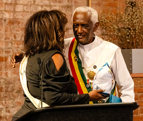 Dr. Menna Demessie inducts  Aklilu Demessie into Cleveland International Hall of Fame
