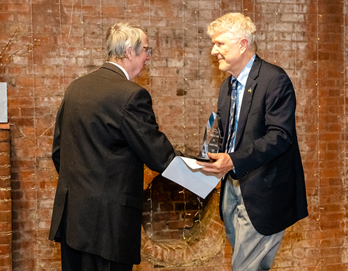 Dr. George Jaskiw inducts Andy Fedynsky into the Cleveland International Hall of Fame