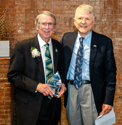 Dr. George Jaskiw inducts Andy Fedynsky into the Cleveland International Hall of Fame