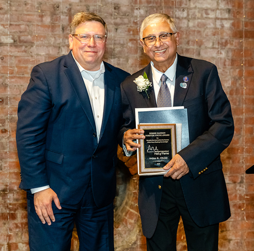 Joe Cimperman presents Anjan Ghose with Debbie Hanson Forever Young Award