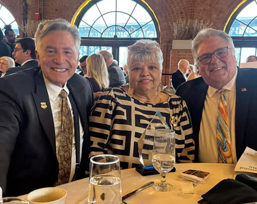 Jim and Joe Craciun with Lucy Torres