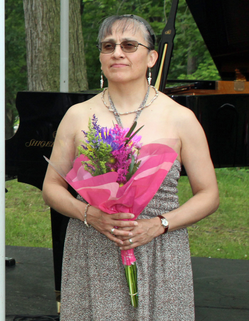 Ruth Desiree Logan with flowers