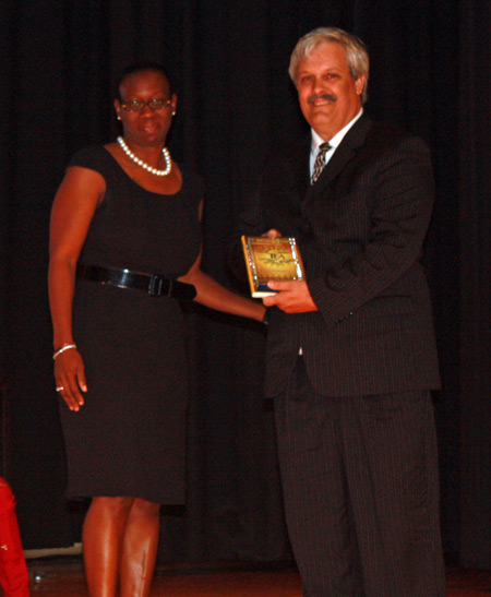 Lt. Edward D. Teare's brother David accepted the award from Nina Turner