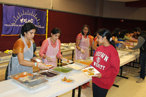 Serving food at Kasturi Kannada Diwali event