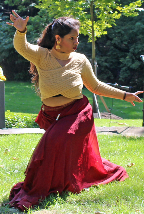 a young lady performs classical and then Bollywood dances