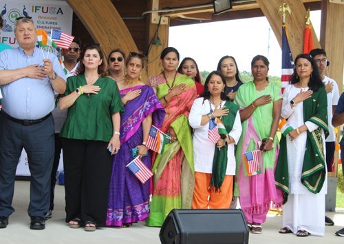 50 civic and community leaders gathered on the India festival USA stage to sing the national anthems of the USA and India