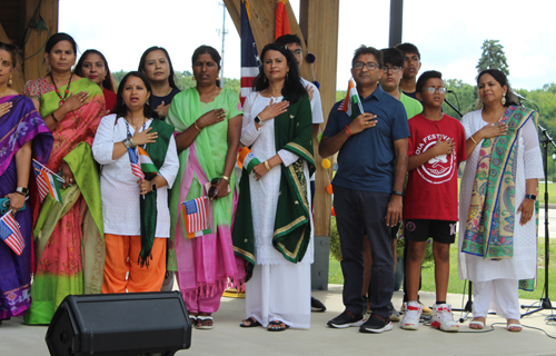 50 civic and community leaders gathered on the India festival USA stage to sing the national anthems of the USA and India