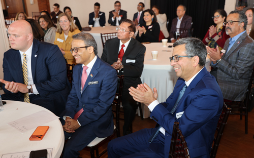 Consul laughing at remarks