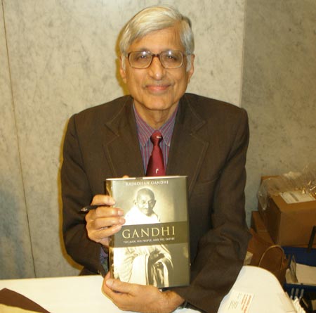 Rajmohan Gandhi with his new book about Mahatma Gandhi