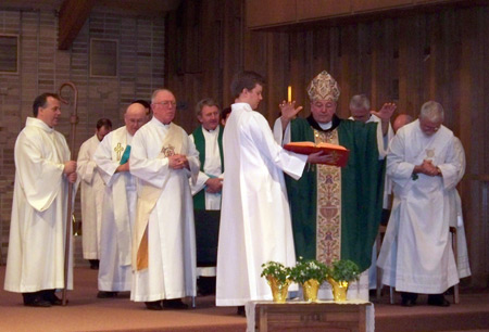 Bishop Gries and other priests say Mass