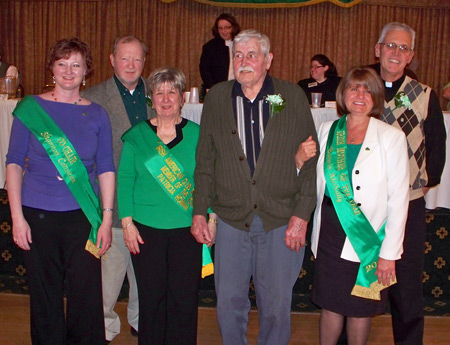 2010 St. Patrick's Day Parade Co-Chair Shannon Corcoran, Parade Executive Director Daniel M. Corcoran, IACES Member of the Year Patricia Homan, Parade Grand Marshall John Hayes, Irish Mother of the Year Bonnie McNally and Parade Co-Chair Fr. Tom Johns 