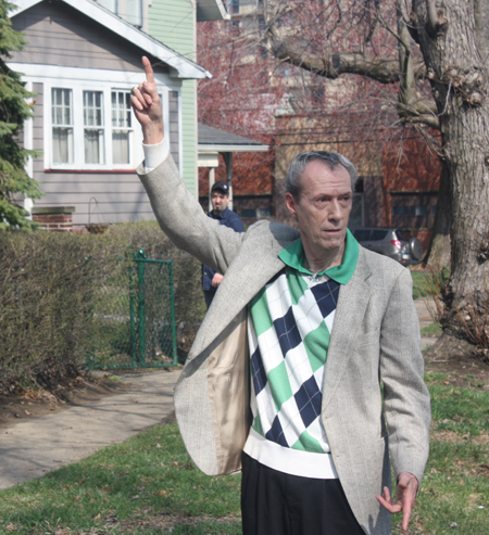 Johnny Kilbane relative pointing at Kilbane Town street sign