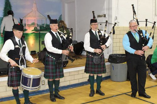 Bagpipers at Mickey Coyne party - 87th Cleveland Pipe Band members Drew Donnelly (drum), Mark Donnelly, Brian Borowski, Michael Crawley