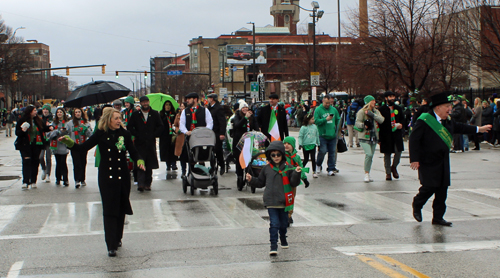 Grand Marshal Mickey Coyne and Family lead the Parade