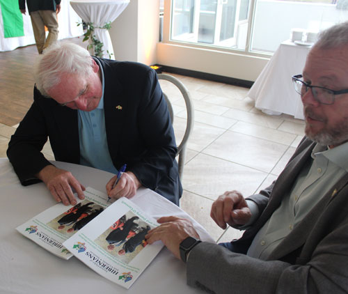 Taoiseach Bertie Ahern signing AOH programs