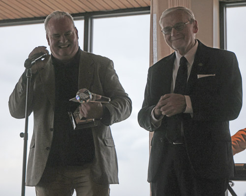 Kevin Quinn presents the award to his father Gerry Quinn