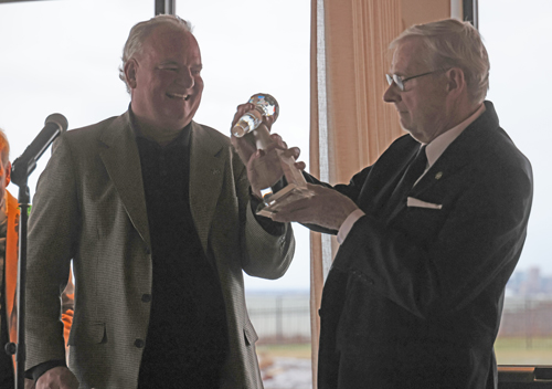 Kevin Quinn presents the award to his father Gerry Quinn