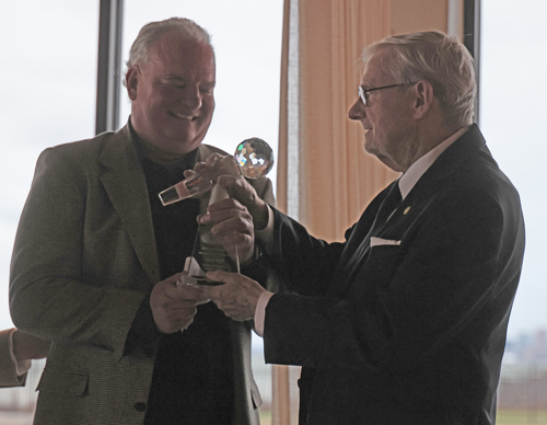 Kevin Quinn presents the award to his father Gerry Quinn