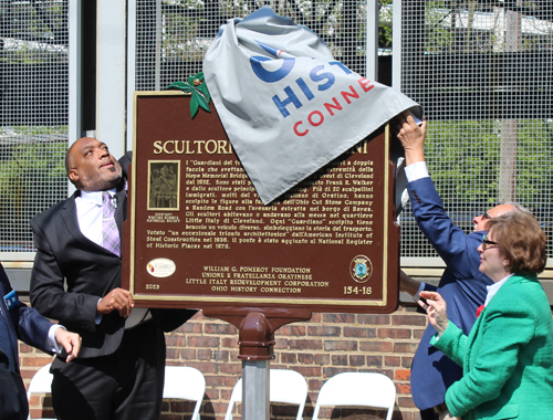 Tom Chema, Blaine Griffin, Joe Marinucci and Mary Fatica Martin unveil the historical marker