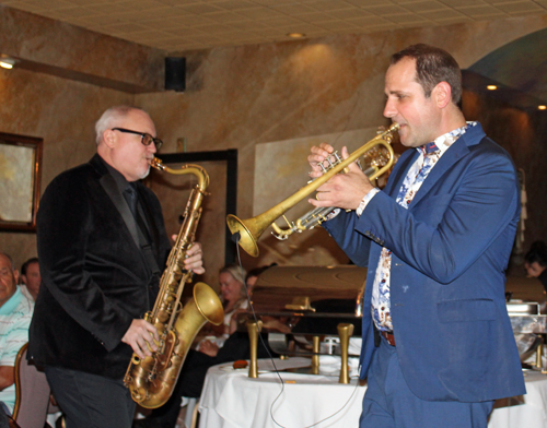 Christopher Burge and Dominick Farinacci enter in thrugh the audience