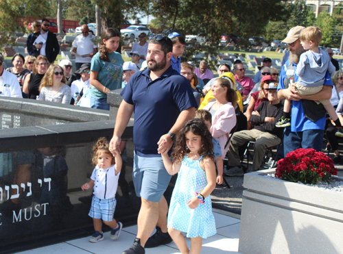 The seventh candle was lit by the great-grandchildren of Holocaust survivors