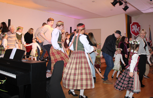 Youngsters from Svyturiukai Lithuanian Folk Dance Group  with audience
