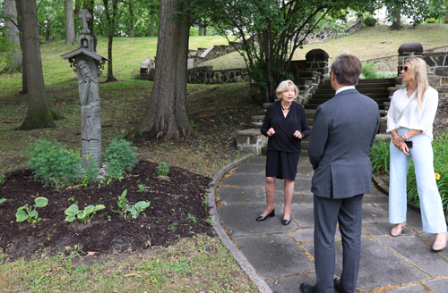 Honorary Consul Ingrida Bublys (and he daugher) showing the Garden