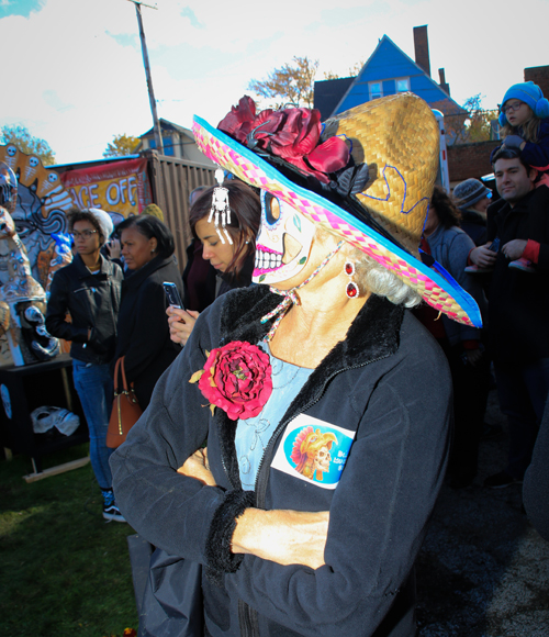 Getting ready for the Skulls and Skeletons procession on Day of the Dead in Cleveland