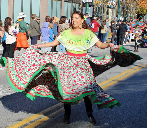 girl dancing at ay of the Dead Skulls and Skeletons Parade in Cleveland 2022