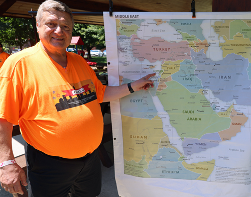 Pierre Bejjani pointing to map of Lebanon